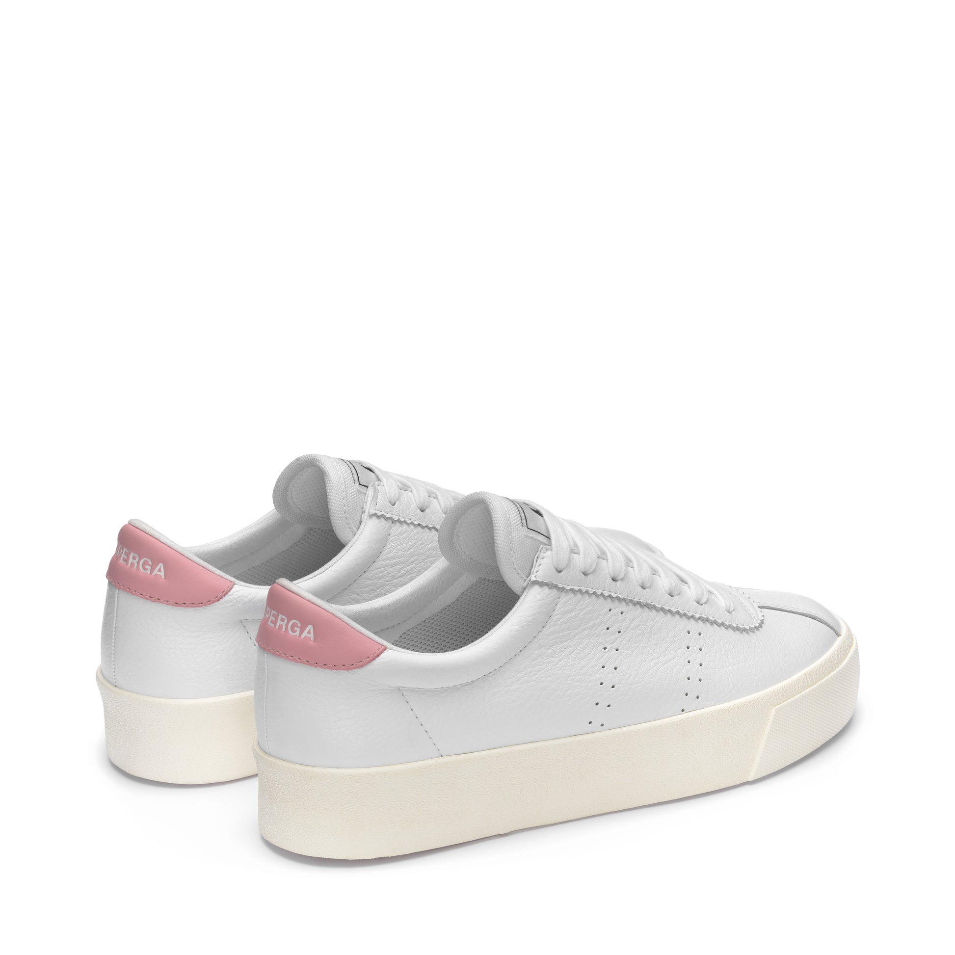 White leather shoes with pink detail and cream platform rubber outer sole slight back view