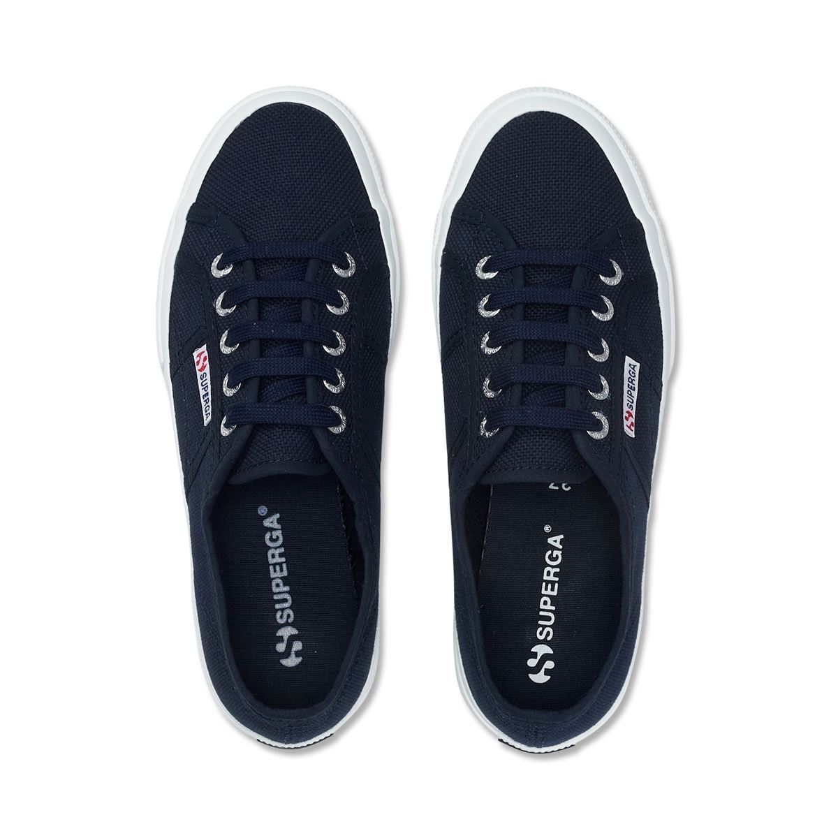 navy blue canvas sneakers with white rubber outer sole top view
