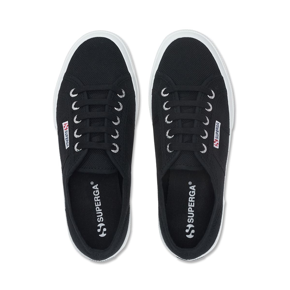 pair of navy canvas Superga shoes top angle