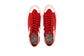 pair of red Superga shoes with rubber outer and white stripes top view