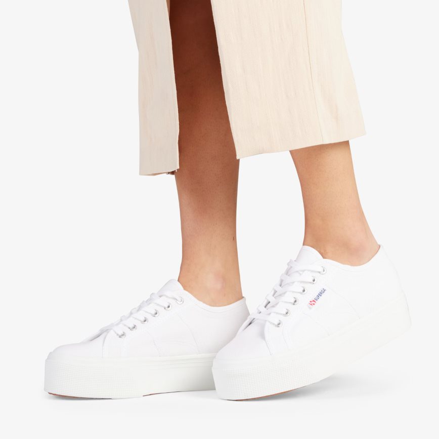 White Canvas Platform Superga shoe modelled on foot